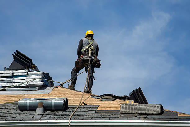 Professional Storm Damage Roof Repair technician working in Hamlet, NC